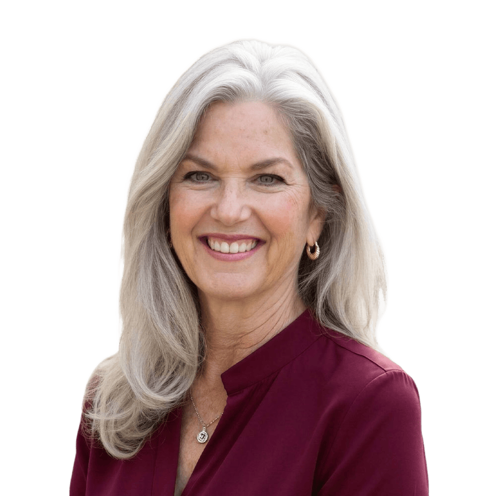Smiling gray-haired woman in burgundy blouse portrait